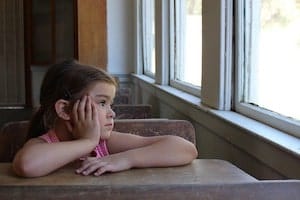 I Saw The Sign: Bullied Girl Sitting Looking Out Window